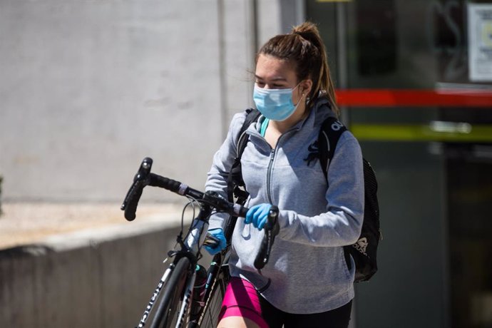 Athletes training on the CSD running tracks on the first day of its opening during the Covid-19 Pandemic. 18  May, 2020 in Madrid, España