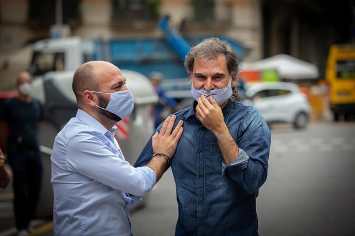 El presidente de mnium Cultural, Jordi Cuixart 8d) y el vicepresidente de la asociación, Marcel Mauri. Foto de archivo.