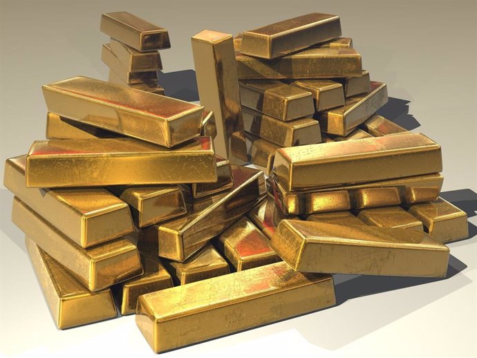 Economía.- El oro no encuentra techo tras romper la barrera de los 2.000 dólares
