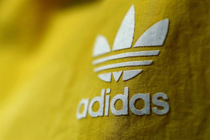 FILED - 14 March 2018, Bavaria, Herzogenaurach: A general view of the German sportswear manufacturer Adidas logo on an item of clothing during the company's annual press conference. Adidas posted gains in 2019, with revenues adjusted for currency effect