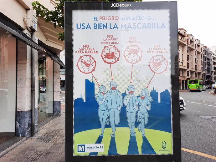 Cartel en Bilbao aconsejando el uso de la mascarilla