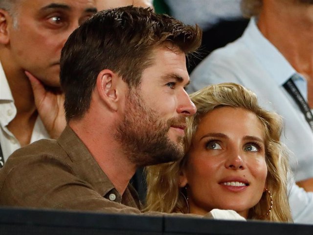 Chris Hemsworth and his wife Elsa Pataky watch the men's singles final match between Roger Federer of Switzerland and Marin Cilic of Croatia on day 14 of the 2018 Australian Open at Melbourne Park on January 28, 2018 in Melbourne, Australia.