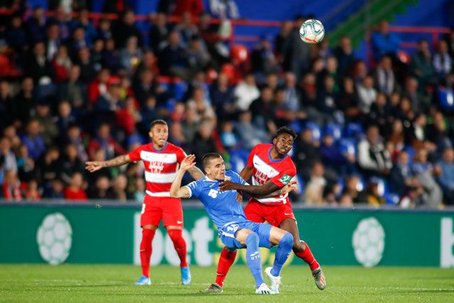 Yan Eteki of Granada and Mauro Arambarri of Getafe CF in action during the spanish league La Liga football match played between Getafe CF and Granada CF at Coliseum Alfonso Perez in Getafe, Madrid, Spain, on October 31, 2019.