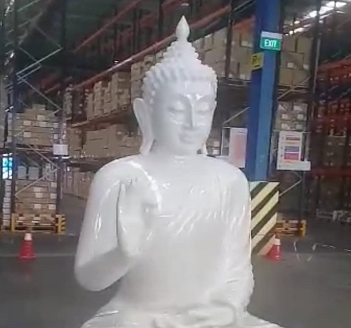 Buda gigante en el edificio del Reloj