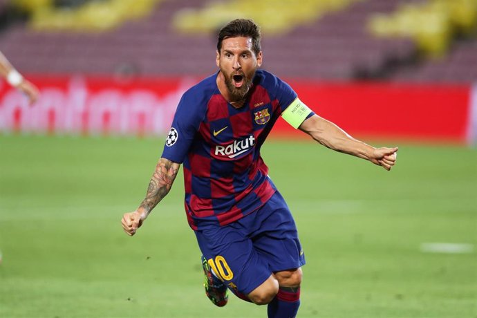 HANDOUT - 08 August 2020, Spain, Barcelona: Barcelona's Lionel Messi celebrates scoring his side's first goal during the UEFAChampions League round of 16 second leg soccer match between  Barcelona and Napoli at the Camp Nou Stadium.