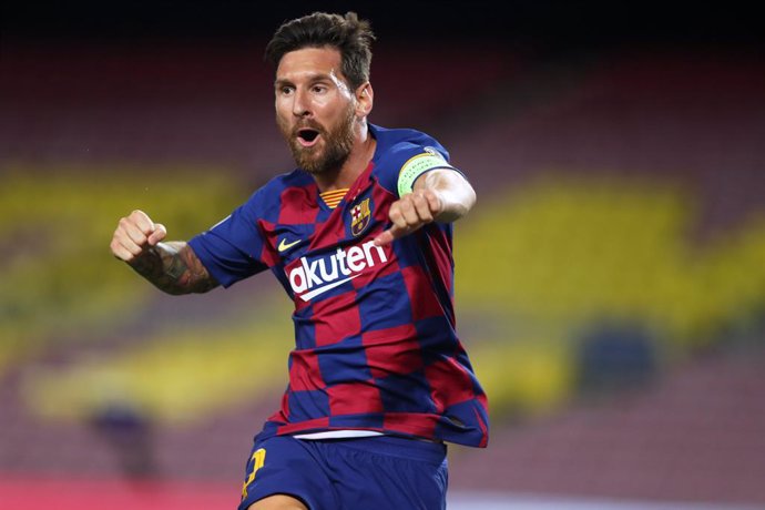 HANDOUT - 08 August 2020, Spain, Barcelona: Barcelona's Lionel Messi celebrates scoring during the UEFA Champions League round of 16 second leg soccer match between Barcelona and Napoli at the Camp Nou Stadium