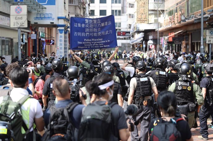 China.- Al menos 90 detenidos en las protestas convocadas en Hong Kong coincidie