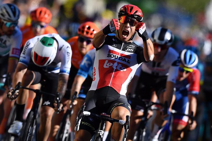 31 August 2020, France, Sisteron: Australian cyclist Caleb Ewan of team Lotto Soudal celebrates as he crosses the finish line to win the third stage of the 107th edition of the Tour de France cycling race, 198km from Nice to Sisteron.