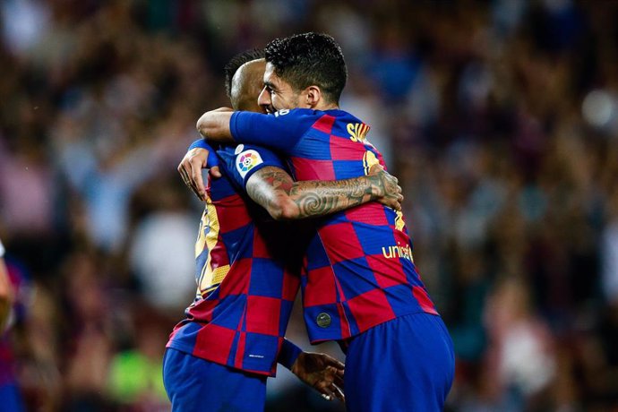 22 Arturo Vidal from Chile of FC Barcelona celebrating his goal with 09 Luis Suarez from Uruguay of FC Barcelona during the La Liga match between FC Barcelona and Sevilla FC in Camp Nou Stadium in Barcelona 06 of October of 2019, Spain.