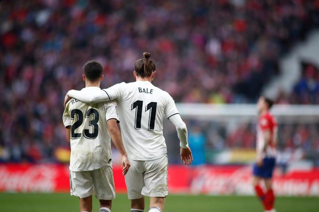 Gareth Bale y Sergio Reguilón celebran un gol con el Real Madrid