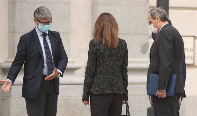El presidente de la Generalitat, Quim Torra (d), a su llegada al Tribunal Supremo (TS),   de la consellera de Presidencia y portavoz del Govern, Meritxell Budó (c), en Madrid (España), a 17 de septiembre de 2020. 