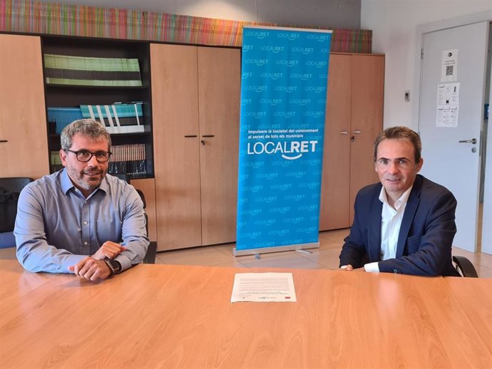 El director territorial en Catalunya de Grandes Empresas de Orange, Víctor Vera (derecha) y el director general de Localret, Andreu Francisco (izquierda)