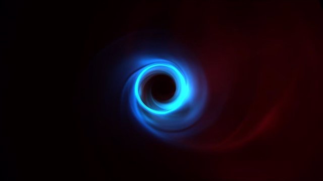 Simulación del agujero negro M87 que muestra el movimiento del plasma mientras gira alrededor del agujero negro. El anillo delgado y brillante que se puede ver en azul es el borde de lo que llamamos la sombra del agujero negro.