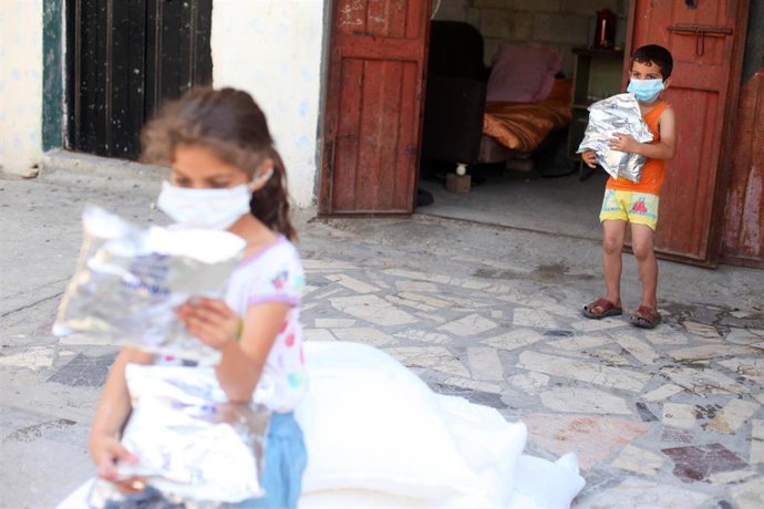 Reparto de ayuda de la UNRWA en la Franja de Gaza