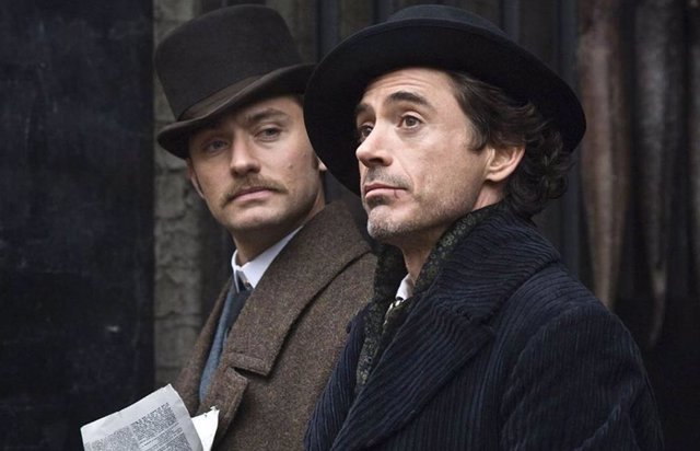 Robert Downey Jr.  Y Jude Law en Sherlock Holmes