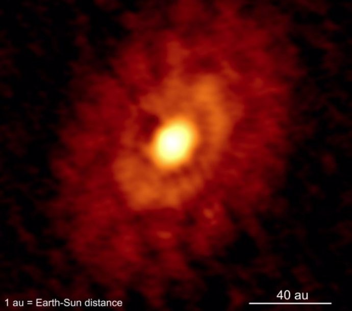 Una imagen revela formación planetaria en una estrella en crecimiento