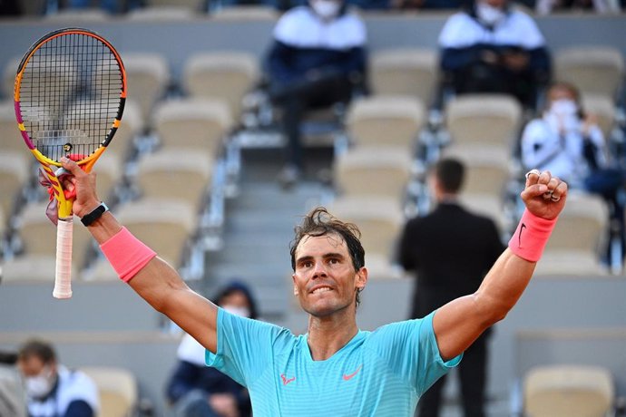 AV.- Tenis/Roland Garros.- Nadal hace el 12+1 en París y caza a Federer en el 'G