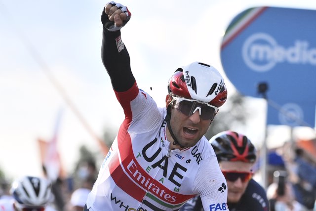 Italian cyclist Diego Ulissi of UAE Team Emirates celebrates as he crosses the finish line to win the thirteenth stage of the Giro d'Italia 2020 cycling race, 192 KM from Cervia to Monselice. Photo: Marco Alpozzi/LaPresse via ZUMA Press/dpa