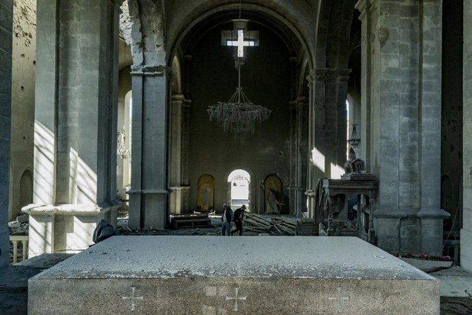 11 October 2020, Azerbaijan, Shusha: A view inside the damaged Holy Savior Cathedra.