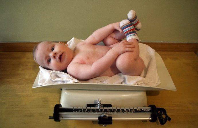 Baby on the measurement of weight