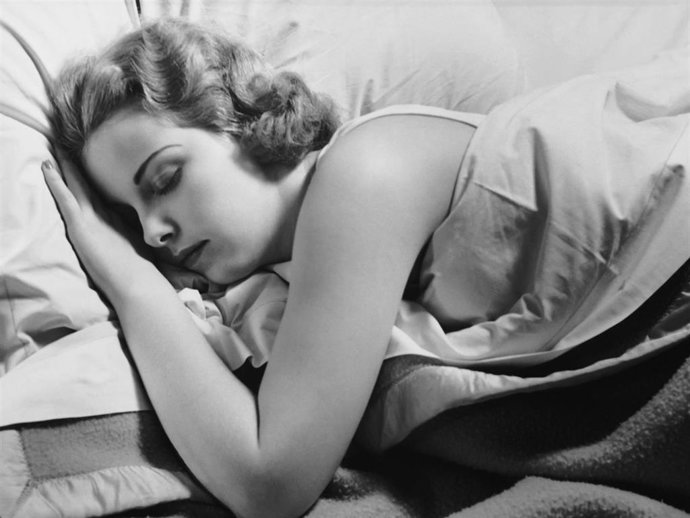 Woman sleeping in bed