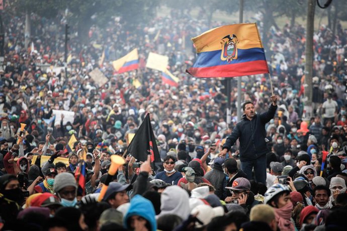 11 October 2019, Ecuador, Quito: People attend an anti-government protest. The S
