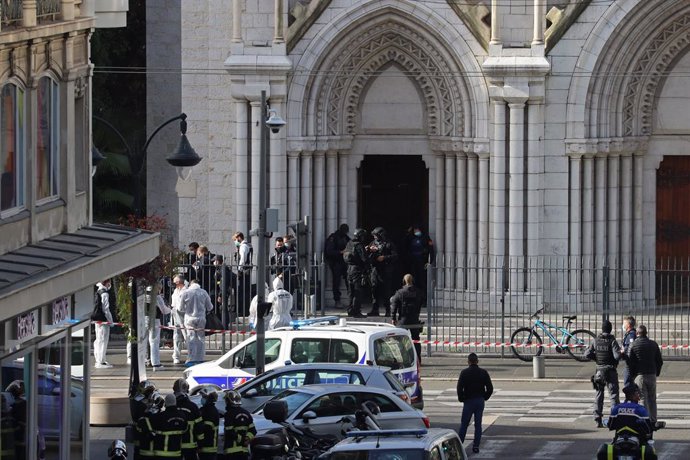 29 October 2020, France, Nice: French members of the elite tactical police unit (RAID) enter to search the Basilica of Notre-Dame de Nice after a knife attack in Nice. At least one person has been killed and several others injured in a knife attack at a