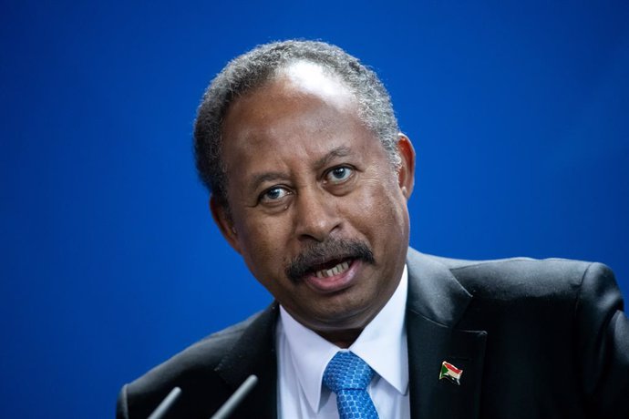 FILED - 14 February 2020, Berlin: Sudan's Prime Minister Abdalla Hamdok speaks during a press conference with German Chancellor Angela Merkel (not pictured) at the Federal Chancellery. Hamdok tweetted that he spoke with Josep Borrell, High Representativ
