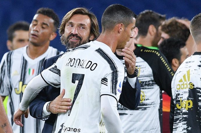 Andrea Pirlo coach of Juventus hugs Cristiano Ronaldo of Juventus FC at the end of the Italian championship Serie A football match between AS Roma and Juventus FC on September 27, 2020 at Stadio Olimpico in Rome, Italy - Photo Giuseppe Maffia / Sportpho