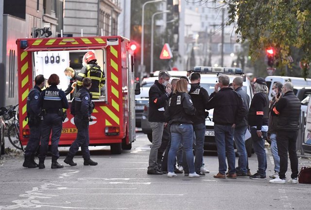31 October 2020, France, Lyon: Rescue workers and police officers are on the scene where a Greek Orthodox priest was shot. The Greek priest was about to close the church when an attacker armed with a sawn-off shotgun  shot him and fled. The incident occ