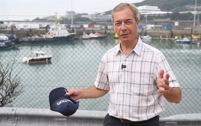 12 August 2020, England, Dover: Nigel Farage arrives at Dover, where people thought to be migrants have previously been brought ashore by Border Force officers following a number of small boat incidents in the English Channel. Photo: Kirsty O'connor/PA 