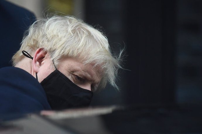 02 November 2020, England, London: UK Prime Minister Boris Johnson leaves 10 Downing Street to appear at the House of Commons where he warned MPs that coronavirus deaths over the winter could be twice as high as during the first wave of the pandemic, ah