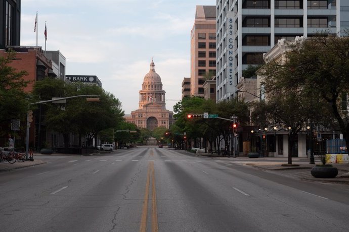 19 March 2020, US, Austin: A typically heavy traffic area of Congress Avenue is seen empty due to Coronavirus pandemic and restrictions in downtown Austin. Photo: Sandy Carson/ZUMA Wire/dpa