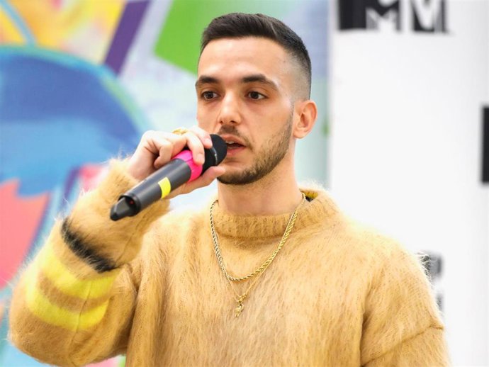 Musician C. Tangana speaks on stage during a press conference to announce Bilbao as the host city for the EMA's 2018 at MTV London on November 12, 2017 in London, England.