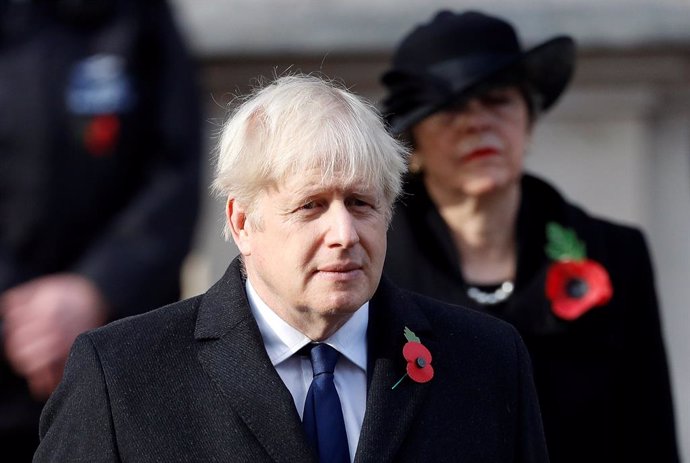 08 November 2020, England, London: British Prime Minister Boris Johnson and former prime minister Theresa May attend the Remembrance Sunday service at the Cenotaph War memorial. Photo: Peter Nicholls/PA Wire/dpa