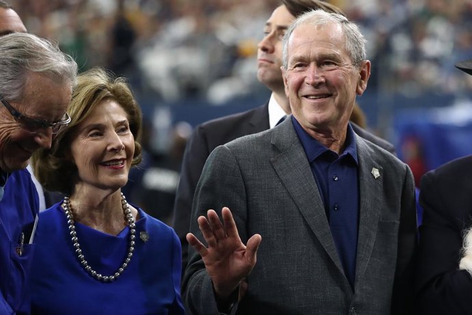 L'expresident George W. Bush i la seva dona Laura