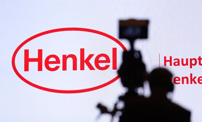 FILED - 06 April 2017, North Rhine-Westphalia, Duesseldorf: A cameraman films the logo of the German chemical and consumer goods firm Henkel at the company's general meeting. Henkel, recorded a slight decline in revenue in the first quarter of this year