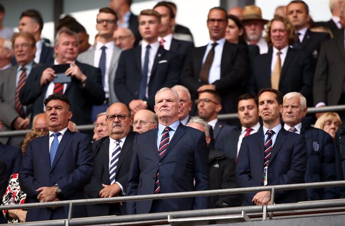 07 September 2019, England, London: Chairman of The English Football Association (FA), Greg Clarke (C), is pictured in the stands during the UEFAEURO 2020 qualifiers Group A soccer match between England and Bulgaria, at the Wembley Stadium. Photo: Tim 