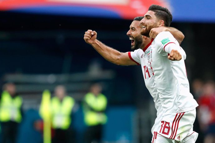 Saint Petersburg, 15-06-2018 , World Cup 2018 , Saint Petersburg Stadium. Iran striker Alireza Jahanbakhsh (R) celebrating the victory after the game with Iran striker Saman Ghoddos (L) after the match Morocco - Iran (0-1) .