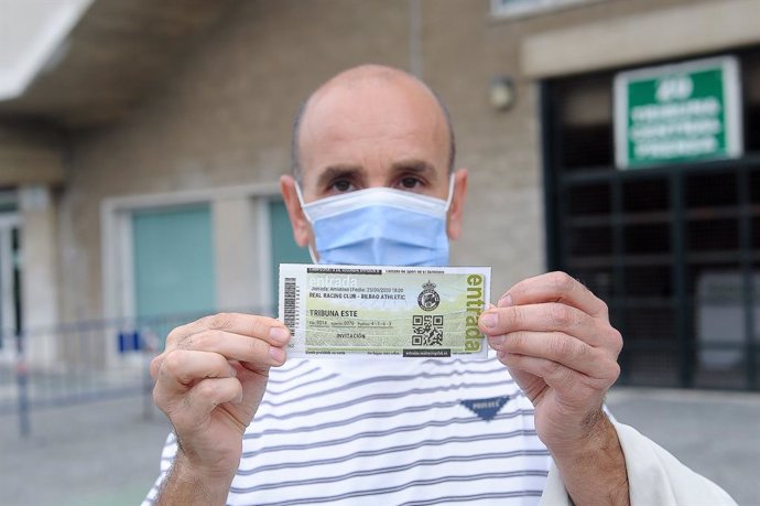 A fan shows his entrance during the first soccer match with the public after the COVID19 pandemic in SmartBank League between Racing de Santander and Athletic Club de Bilbao B at El Sardinero Stadium on September 23, 2020, in Santander, Spain.