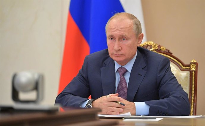 HANDOUT - 14 October 2020, Russia, Novo-Ogaryovo: Russian President Vladimir Putin attends a meeting with members of the government, held via video conference, at the Novo-Ogaryovo state residence. Photo: -/Kremlin/dpa - ATTENTION: editorial use only an