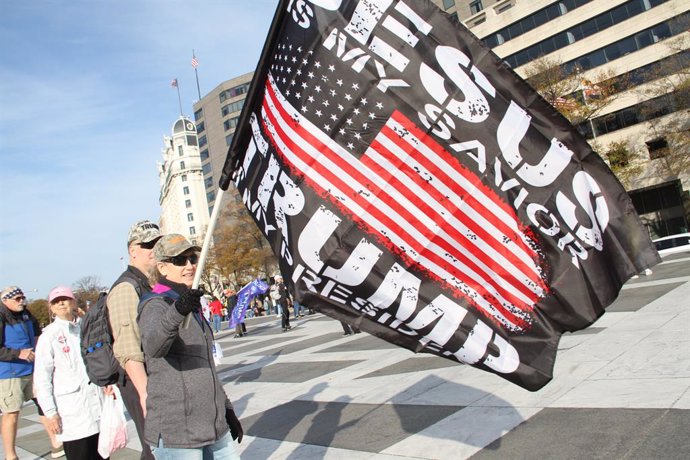 14 November 2020, US, Washington: Supporters of US President Trump take part in a protest at Freedom Plaza under the slogan "Make America Great Again" (MAGA) to demonstrate against the alleged manipulation of election results. Photo: Niyi Fote/TheNEWS2 