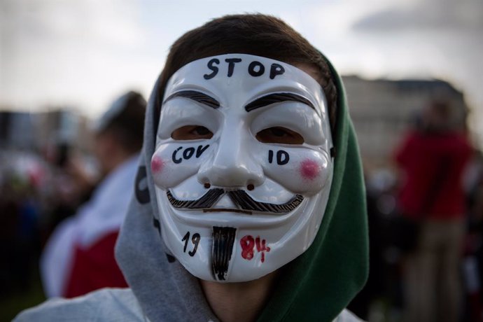 24 October 2020, Poland, Warsaw: A protester takes part in a protest against the government imposed restrictions to prevent the spread of coronavirus. Photo: Attila Husejnow/SOPA Images via ZUMA Wire/dpa
