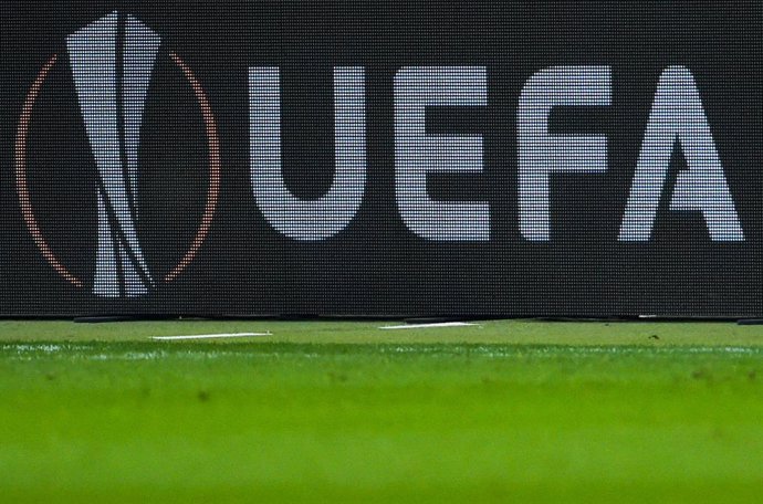 FILED - 29 November 2018, Hessen, Frankfurt_Main: The UEFA logo displayed on an advertising board during the UEFA Europa League Group H soccer match between Eintracht Frankfurt and Olympique Marseille at the Commerzbank-Arena. UEFAon Tuesday reiterated
