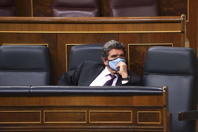 El ministro de Inclusión, Seguridad Social y Migraciones, José Luis Escrivá, durante una sesión plenaria en el Congreso de los Diputados. El Pleno debate hoy el proyecto de Ley Orgánica por el que se modifica la Ley de Educación, la LOMLOE, también cono