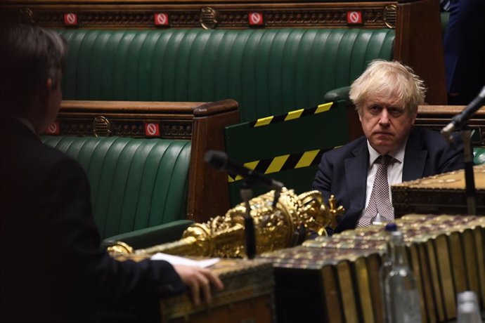 26 November 2020, England, London: UK Prime Minister Boris Johnson  attends the British Parliament session on Coronavirus (Covid-19) updates at the House of Commons.. Photo: Jessica Taylor/Uk Parliament via PA Media/dpa