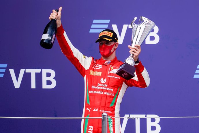 26 September 2020, Italy, Sochi: German Formula 2 driver Mick Schumacher of Prema Theodore Racing team celebrates on the podium after winning the Formula 2 feature race, at the Sochi Autodrom circuit. Photo: James Gasperotti/ZUMA Wire/dpa