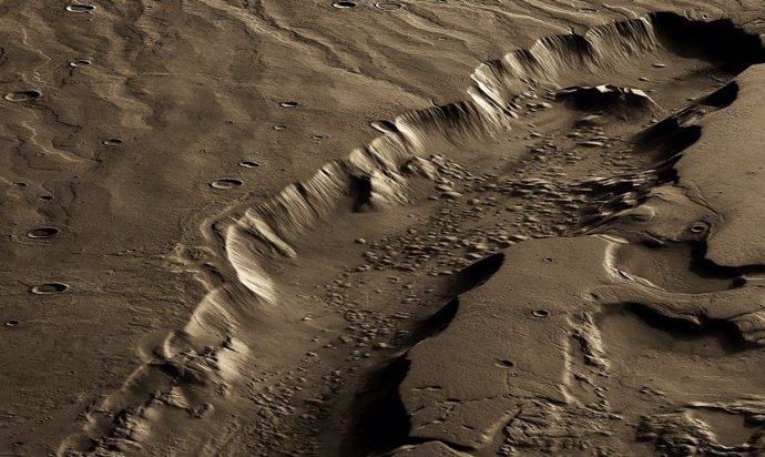 Una vista verticalmente exagerada y en falso color de un gran canal tallado con agua en Marte llamado Dao Vallis