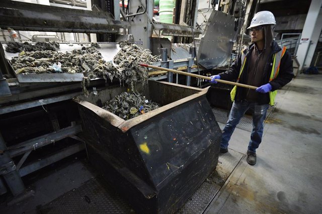 April 12, 2019 - New York, New York, United States: Sewage treatment worker Kam Lau works the solid waste inside the Newtown Creek Water Pollution Control Plant at 329 Greenpoint Avenue, in Brooklyn. Deputy Commissioner Pam Elardo claims that 80 to 90 per