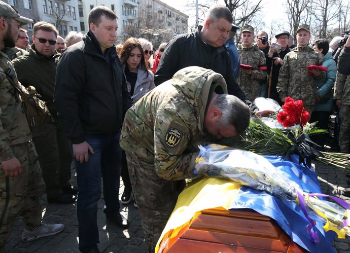 04 April 2019, Ukraine, Kharkiv: Mourners attend the funeral of Yana Chervona, a volunteer member of Ukraine military unit "Donbas Battalion" which was killed during a Combat activity on April the 2nd. Photo: -/Ukrinform/dpa